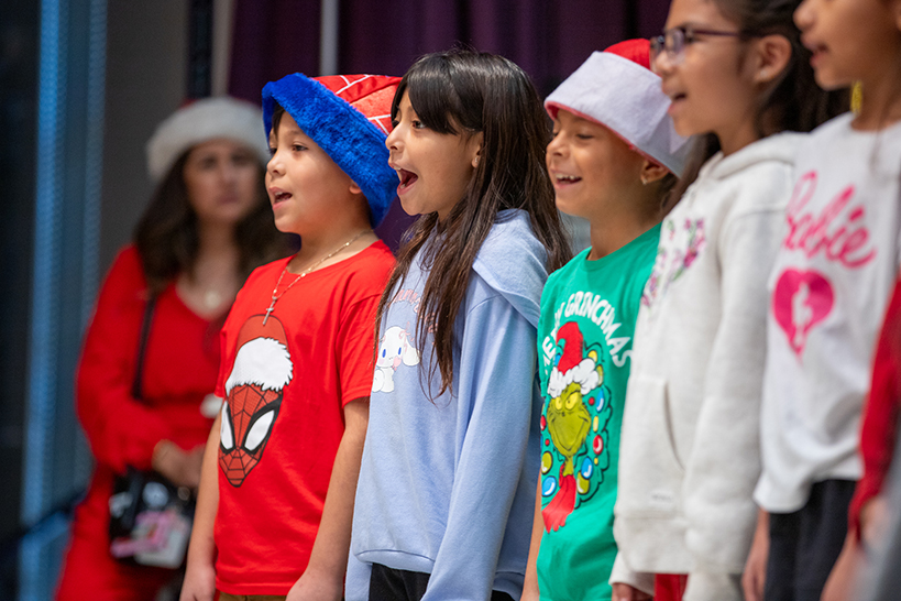 Students sing enthusiastically 