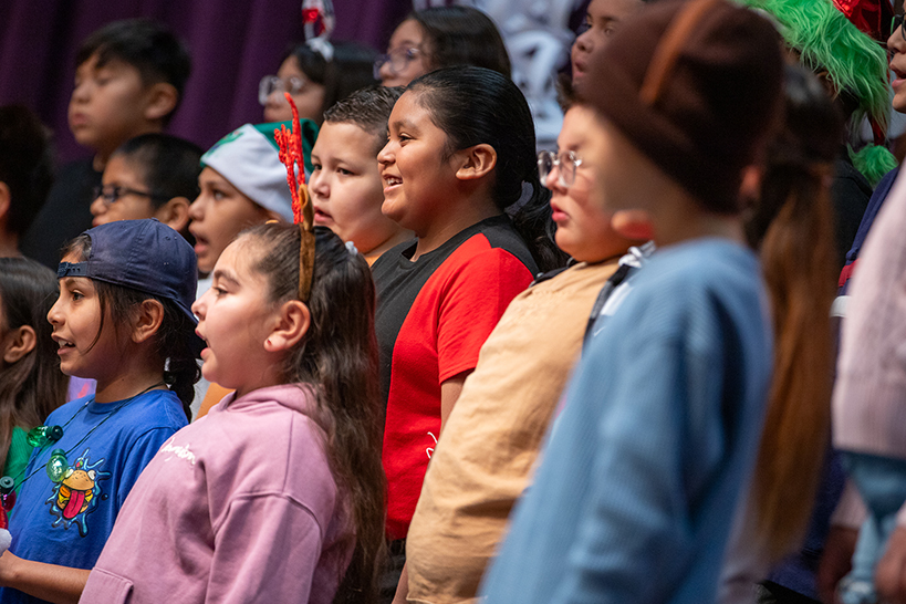 Students sing during the holiday concert rehearsal